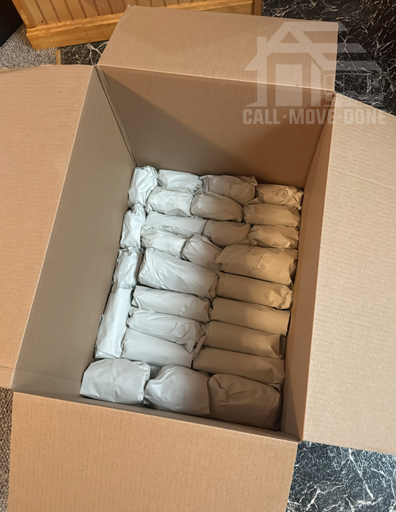Twenty-four wrapped bundles, standing on edge, zero rattle