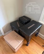 Wrapped desk and ottoman ready for transport
